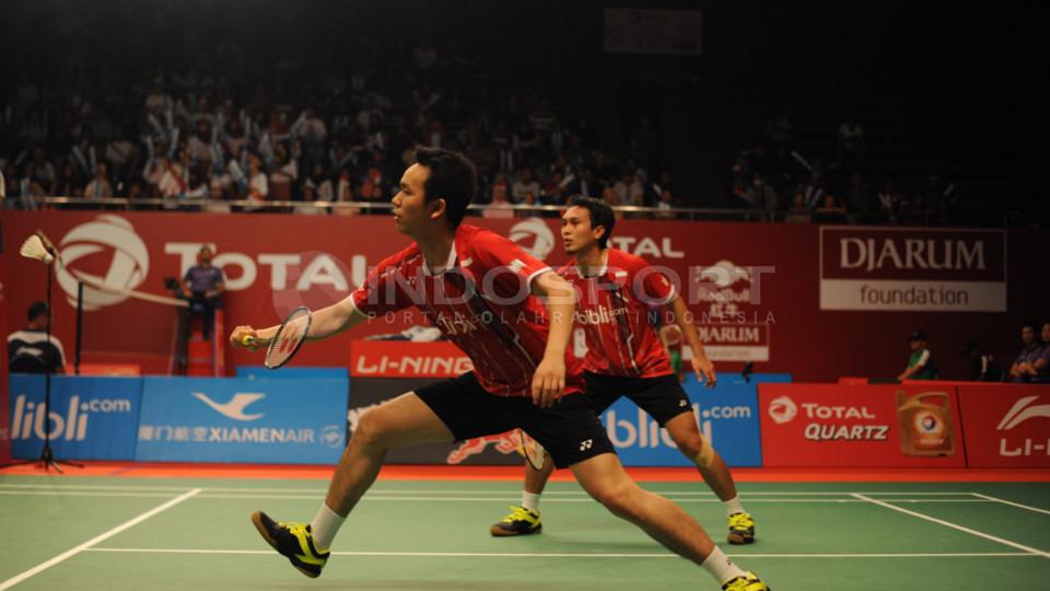 Mohammad Ahsan/Hendra Setiawan susah payah ke babak ketiga setelah dipaksa wakil Prancis Baptiste Careme/Ronan Labar bermain tiga set.